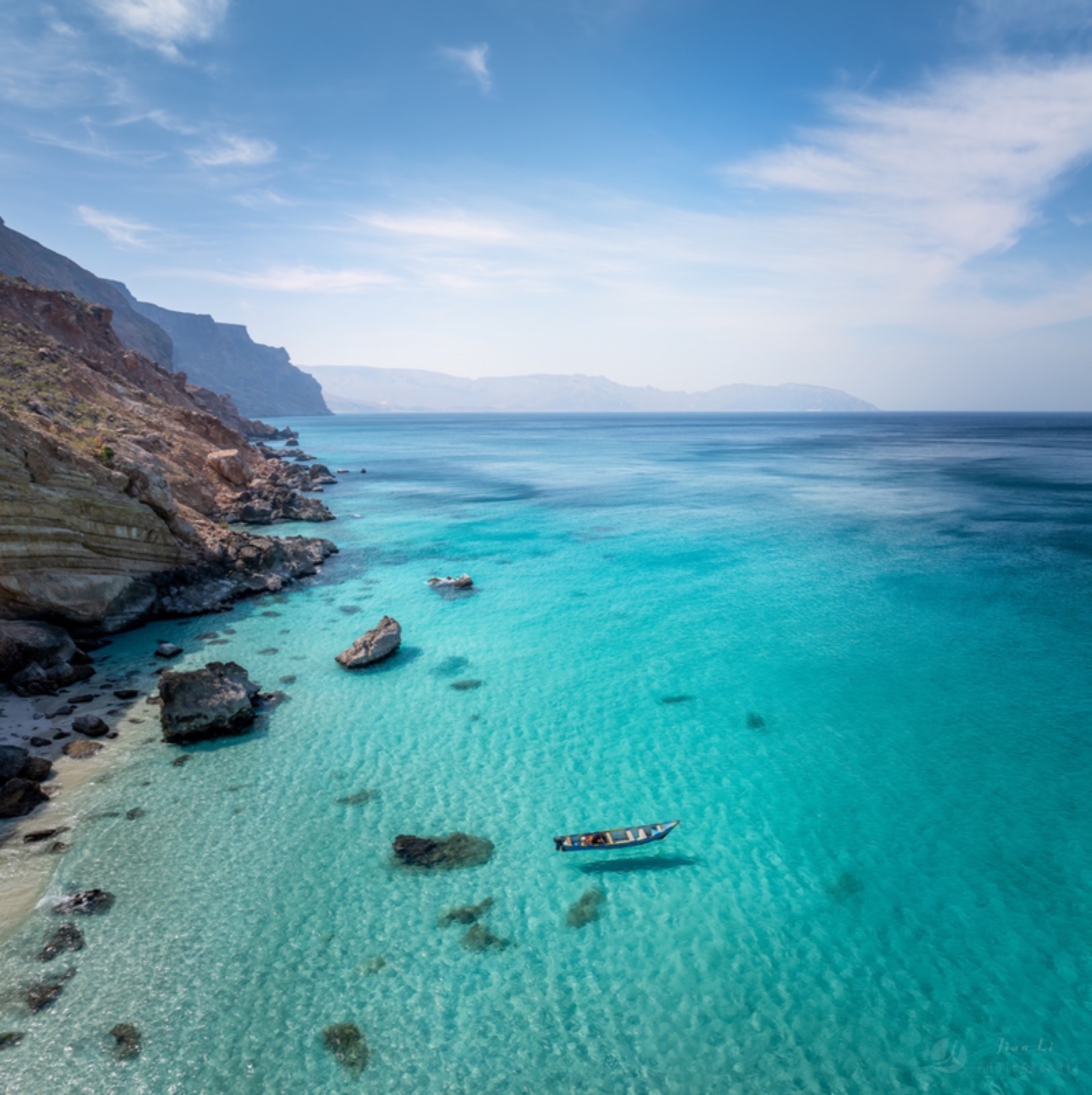 Rocky coast and clear turquoise water